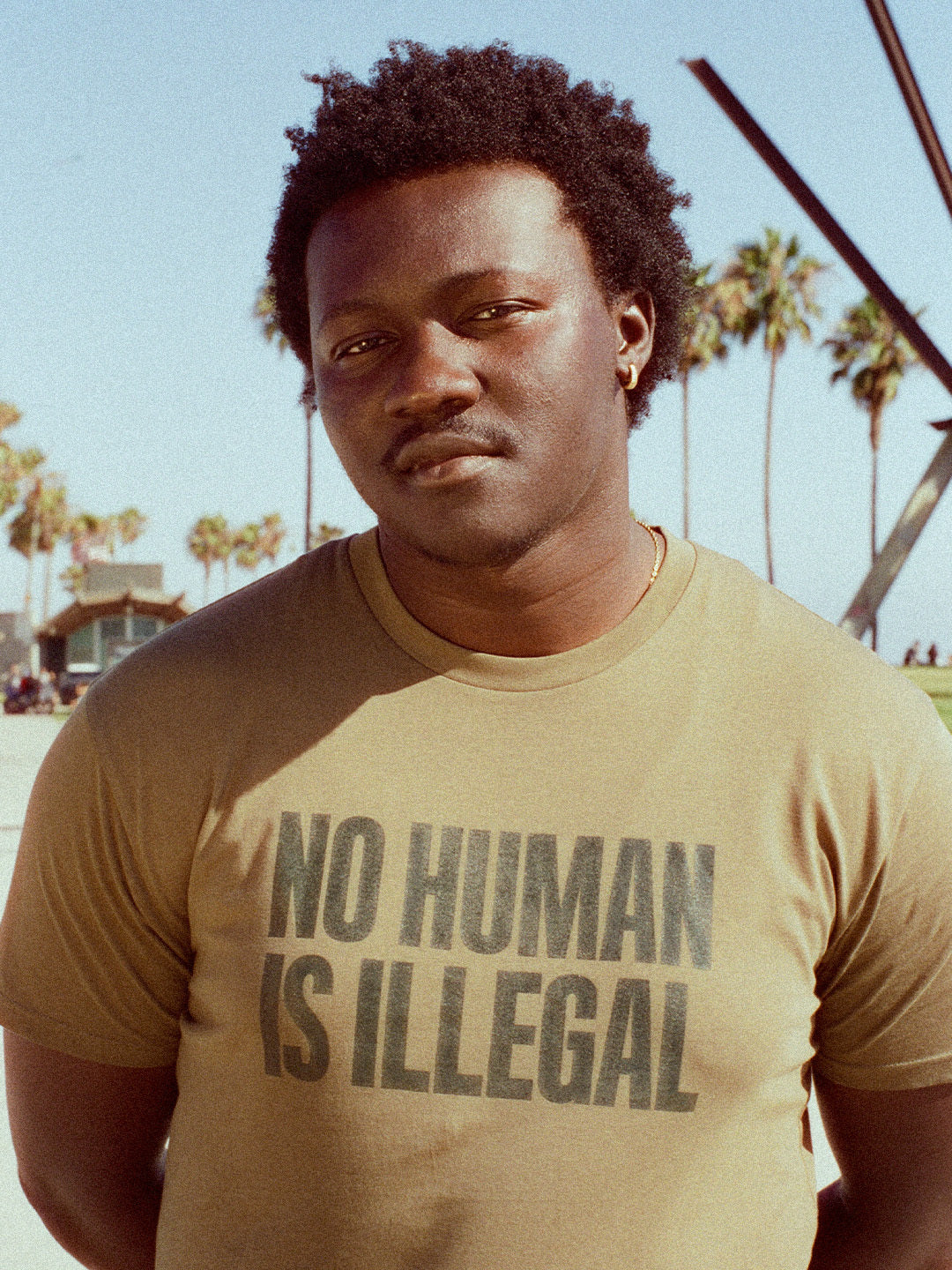 'No Human is Illegal' T-Shirt - Cypress